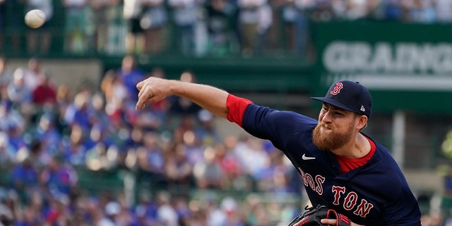 Boston Red Sox starting pitcher Josh Winckowski throws to a Chicago Cubs batter during the first inning of a baseball game in Chicago, Saturday, July 2, 2022. 