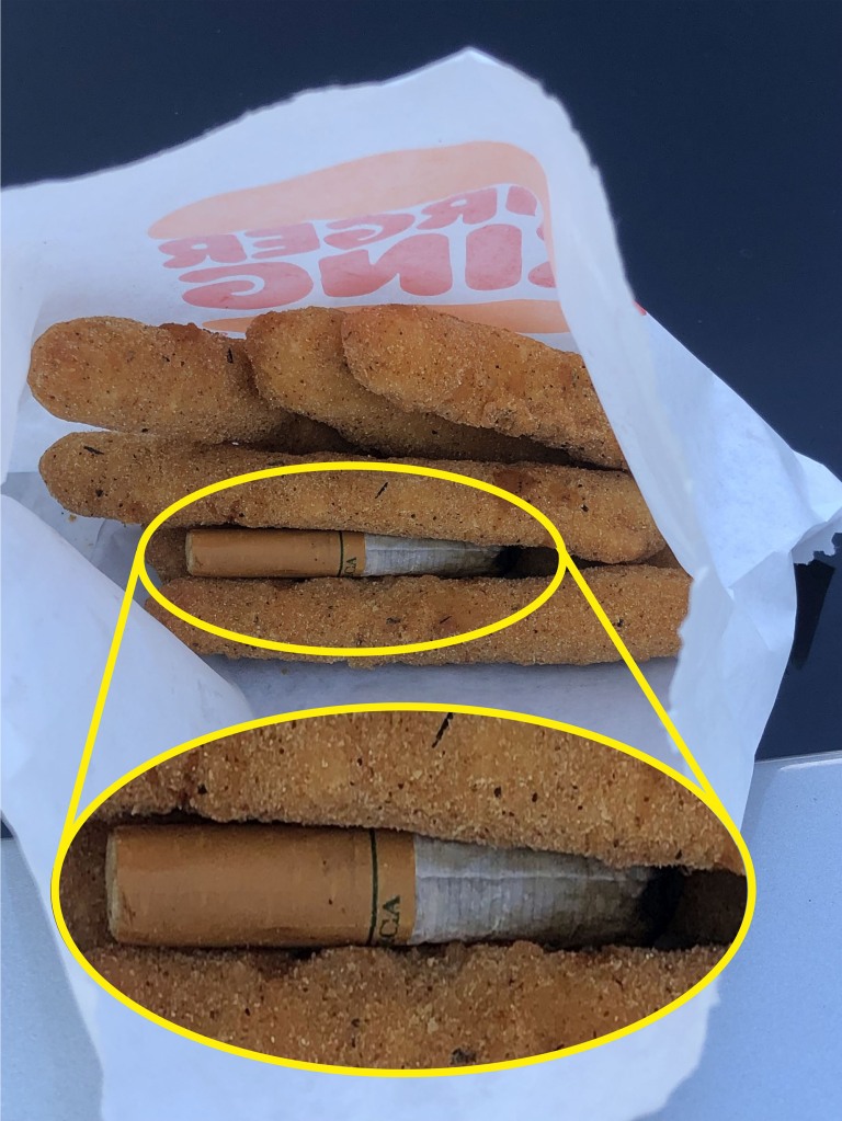 "About six chicken fries in, she [Blaze] said 'oh my God, there is a cigarette in my chicken fries'. I said 'what, no way,'" explained a horrified Holifield. "We were pulling up at home so I got out and had a look. I said 'oh my God, that's a half-smoked cigarette.'"