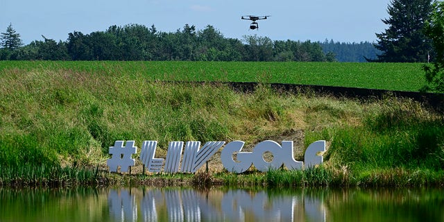 A LIV Golf logo near the 18th green during the pro-am prior to the LIV Golf Invitational — Portland at Pumpkin Ridge Golf Club June 29, 2022, in North Plains, Oregon. 