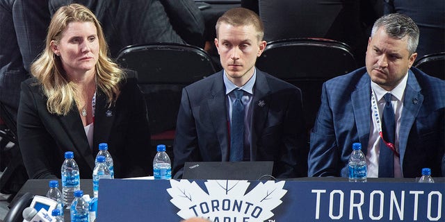 Toronto Maple Leafs hockey team assistant general manager Hayley Wickenheiser, left, takes part in the first round of the NHL draft in Montreal, Thursday, July 7, 2022. Wickenheiser  is one of five women currently serving as assistant GMs in the NHL. 