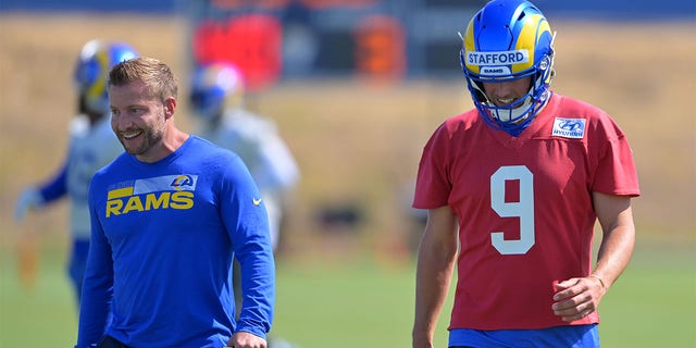 Head coach Sean McVay talks with Matthew Stafford #9 of the Los Angeles Rams during mini camp on June 8, 2022 at the team's facility at California Lutheran University in Thousand Oaks, California. 