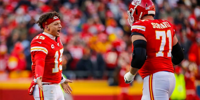 Patrick Mahomes (15) of the Kansas City Chiefs congratulates Mitchell Schwartz (71) of the Kansas City Chiefs after a first quarter touchdown in the AFC Championship game against the Tennessee Titans at Arrowhead Stadium Jan. 19, 2020, in Kansas City, Mo. 