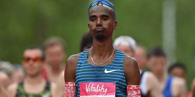 Mo Farah reacts at the start of the men's elite race during the Vitality London 10,000m road race on May 02, 2022 in London, England. 