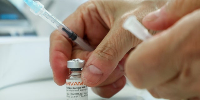 A healthcare worker prepares a syringe at a monkeypox vaccination clinic run by CIUSSS public health authorities in Montreal, Quebec, Canada, June 6, 2022. 