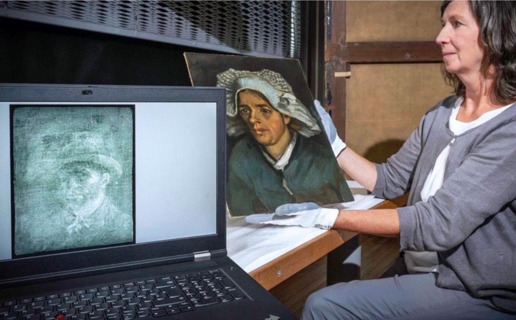 A woman examining Van Gogh's two paintings.