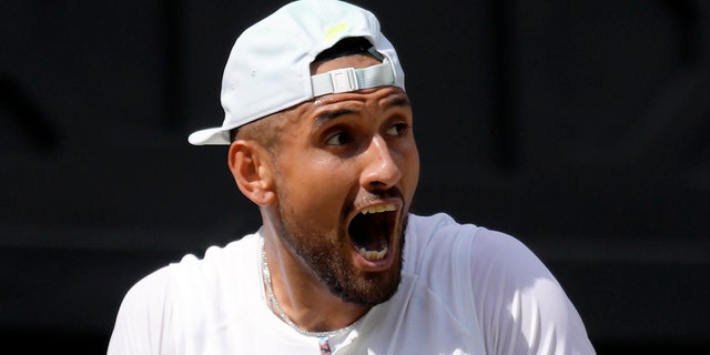 Nick Kyrgios shouts during the final of the men's singles against Novak Djokovic Sunday, July 10, 2022, at Wimbledon.