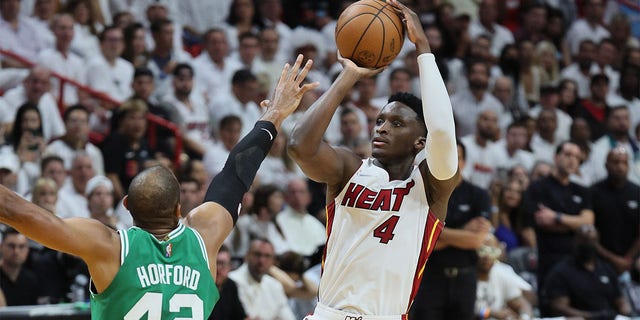 Victor Oladipo #4 of the Miami Heat  against the Boston Celtics during game seven of the Eastern Conference Final at FTX Arena on May 29, 2022 in Miami, Florida. 