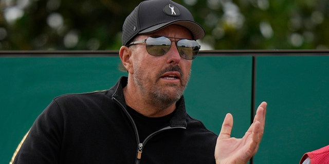 Phil Mickelson, of the U.S., prepares to play from the 3rd tee during the first round of the British Open golf championship on the Old Course at St. Andrews, Scotland, Thursday, July 14 2022.