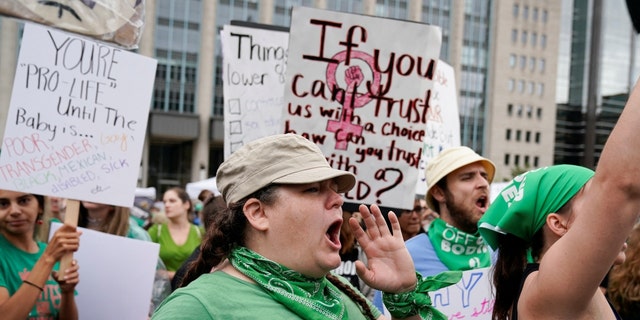 Women’s March activists attend a protest in the wake of the U.S. Supreme Court's decision to overturn the landmark Roe v. Wade abortion decision, in Washington, D.C., U.S., July 9, 2022. 