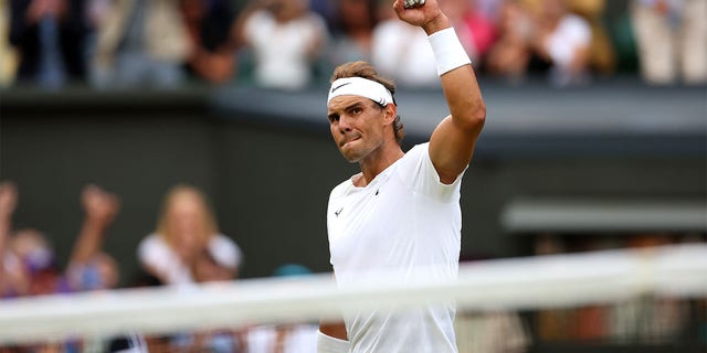 Rafael Nadal celebrates winning match point against Taylor Fritz during Wimbledon at All England Lawn Tennis and Croquet Club on July 6, 2022, in London.