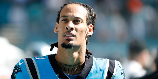 Robby Anderson, #11 of the Carolina Panthers, looks on before the game against the Miami Dolphins at Hard Rock Stadium on November 28, 2021 in Miami Gardens, Florida.