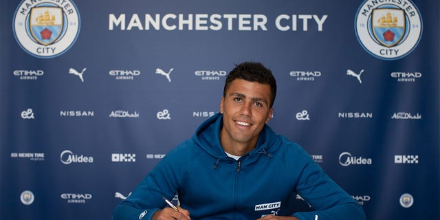 Manchester City's Rodrigo signs a contract extension at Manchester City Academy Stadium on July 12, 2022 in Manchester, England. 