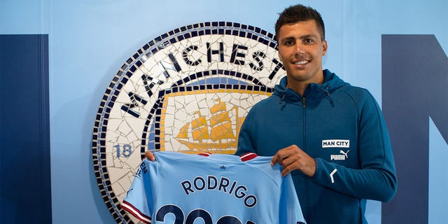 Manchester City's Rodrigo signs a contract extension at Manchester City Academy Stadium on July 12, 2022 in Manchester, England. 