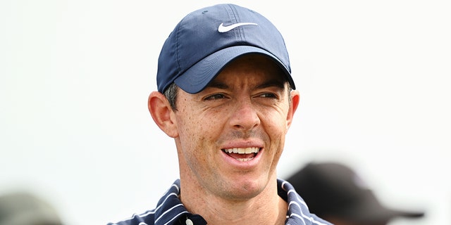 Rory McIlroy of Northern Ireland looks on from the 5th hole tee box during a practice round prior to The 150th Open at St Andrews Old Course on July 11, 2022 in St Andrews, Scotland.