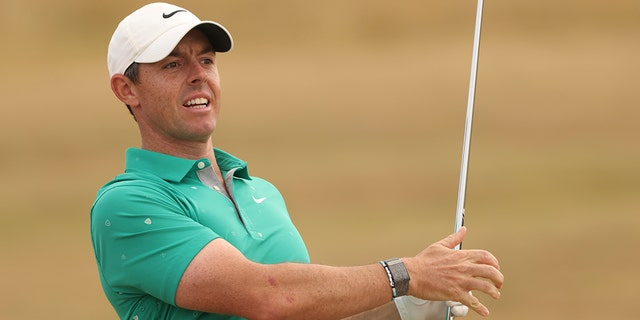 Rory McIlroy of Northern Ireland plays a shot on the fourth fairway during the third round of the British Open on the Old Course at St. Andrews, Scotland, Saturday, July 16, 2022. 