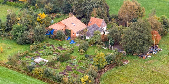 An aerial picture taken on October 15, 2019, shows a view of the farm where a father and six children had been living in the cellar, In Ruinerwold, northern Netherlands.