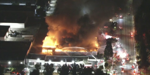 More than 80 firefighters were assigned to work on the massive warehouse fire in Los Angeles.