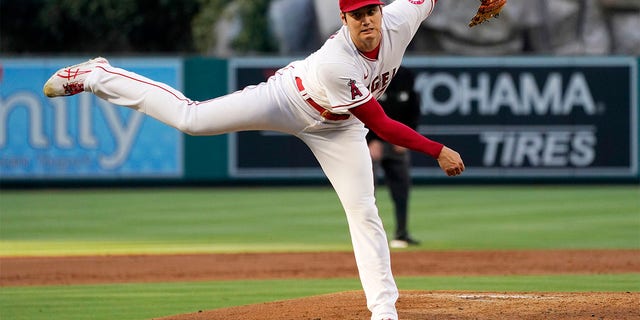 Los Angeles Angels starting pitcher Shohei Ohtani throws to the plate during the first inning of a baseball game against the Houston Astros Wednesday, July 13, 2022, in Anaheim, Calif. 