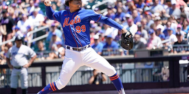 New York Mets pitcher Taijuan Walker delivers against the Miami Marlins during the first inning of a baseball game, Sunday, July 10, 2022, in New York. 