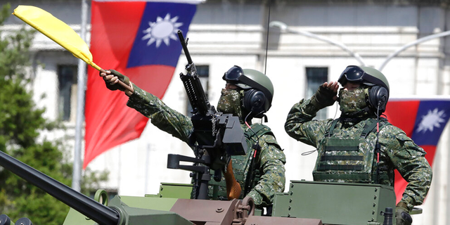 Taiwanese soldiers salute during National Day celebrations in front of the Presidential Building in Taipei, Taiwan. Resident of the capital city told Fox News Digital the military is much better positioned to fight back against a potential Chinese invasion.