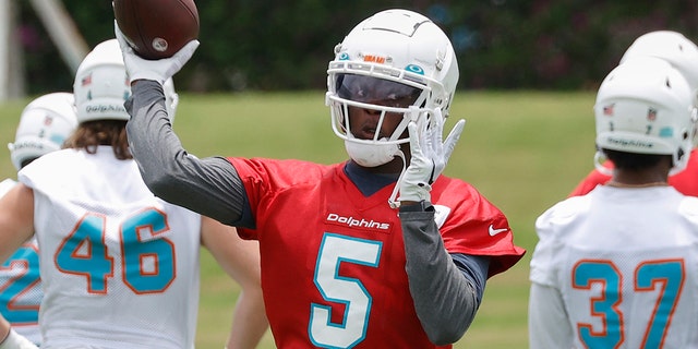 Teddy Bridgewater, #5 of the Miami Dolphins, throws the ball during the Miami Dolphins Mandatory Minicamp at the Baptist Health Training Complex on June 7, 2022 in Miami Gardens, Florida.