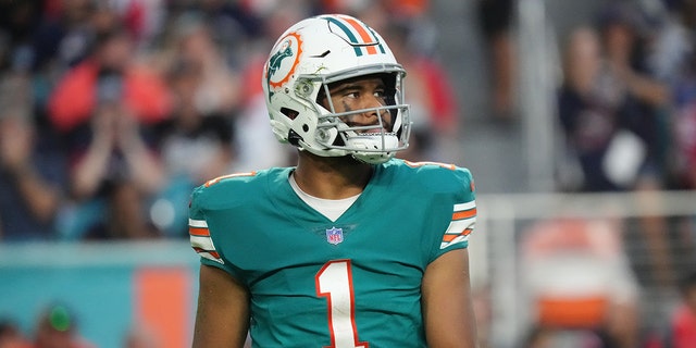 Tua Tagovailoa of the Miami Dolphins in action against the New England Patriots at Hard Rock Stadium Jan. 9, 2022, in Miami Gardens, Fla.