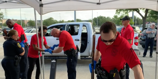 Residents could exchange their guns for gift cards at the event, which was hosted at Wheeler Ave. Baptist Church, according to FOX 26.