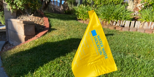 Las Vegas water patrol teams hunt for violations. They issue more warnings with yellow flags planted in the ground than they do citations or fines.