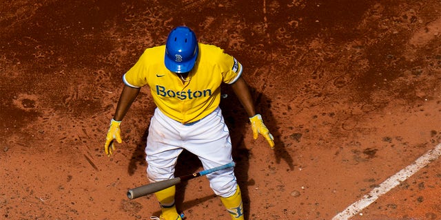 Xander Bogaerts #2 of the Boston Red Sox bats as he wears the Nike City Connect jersey during the sixth inning of a game against the Chicago White Sox on April 18, 2021 at Fenway Park in Boston, Massachusetts. 