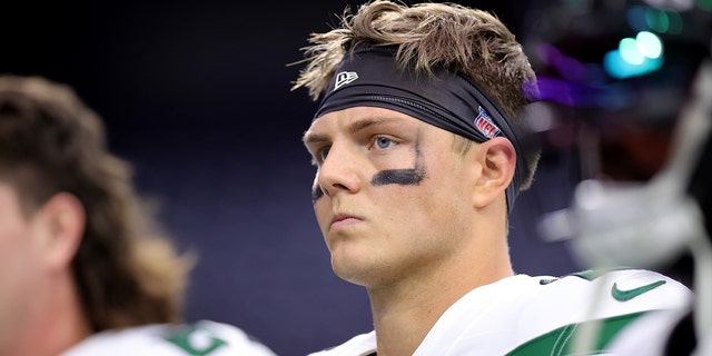 Zach Wilson, #2 of the New York Jets, looks on before the game against the Houston Texans at NRG Stadium on November 28, 2021 in Houston, Texas.