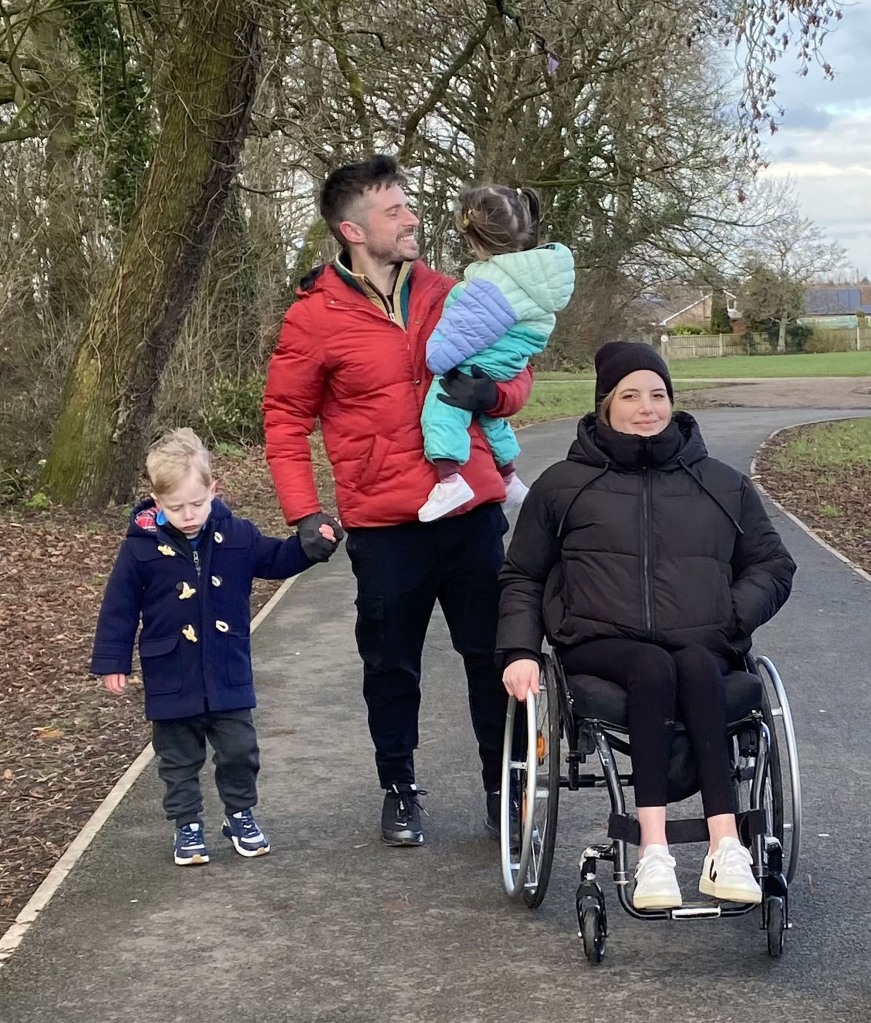 PIC FROM  Kennedy News and Media (PICTURED: JOHN AND JADE REYNOLDS, 33 AND 32, FROM PRESTON, LANCASHIRE, WITH THEIR KIDS, ELIJAH REYNOLDS, FIVE, AND ARELI REYNOLDS, TWO) A man with a disabled wife has revealed the most 'outrageous' questions he gets asked - including whether the couple can have sex or if he 'has a thing' for people in wheelchairs. John and Jade Reynolds, from Preston, Lancashire, regularly get asked invasive questions, both in real life and online, from people wanting to know about the more intimate details of their marriage. Mum-of-two Jade, who was diagnosed with acute transverse myelitis of her spinal cord at the age of 12, admitted that she is regularly asked about whether she can have kids - and even had a stranger ask to touch her leg to see if she could feel it. DISCLAIMER: While Kennedy News and Media uses its best endeavours to establish the copyright and authenticity of all pictures supplied, it accepts no liability for any damage, loss or legal action caused by the use of images supplied and the publication of images is solely at your discretion. SEE KENNEDY NEWS COPY - 0161 697 4266