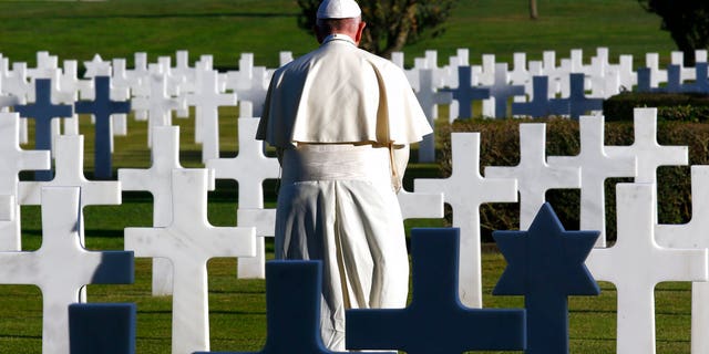 The mass was a celebration of All Souls Day, when Italians honor their dead. The pontiff said the venue, a cemetery, was a fitting place for an anti-war speech.