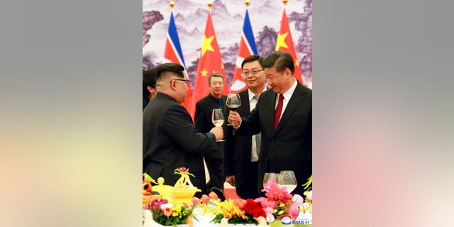 Xi Jinping and Kim Jong Un meet for the first time. Relations between the two have improved since their first meeting in 2018. 