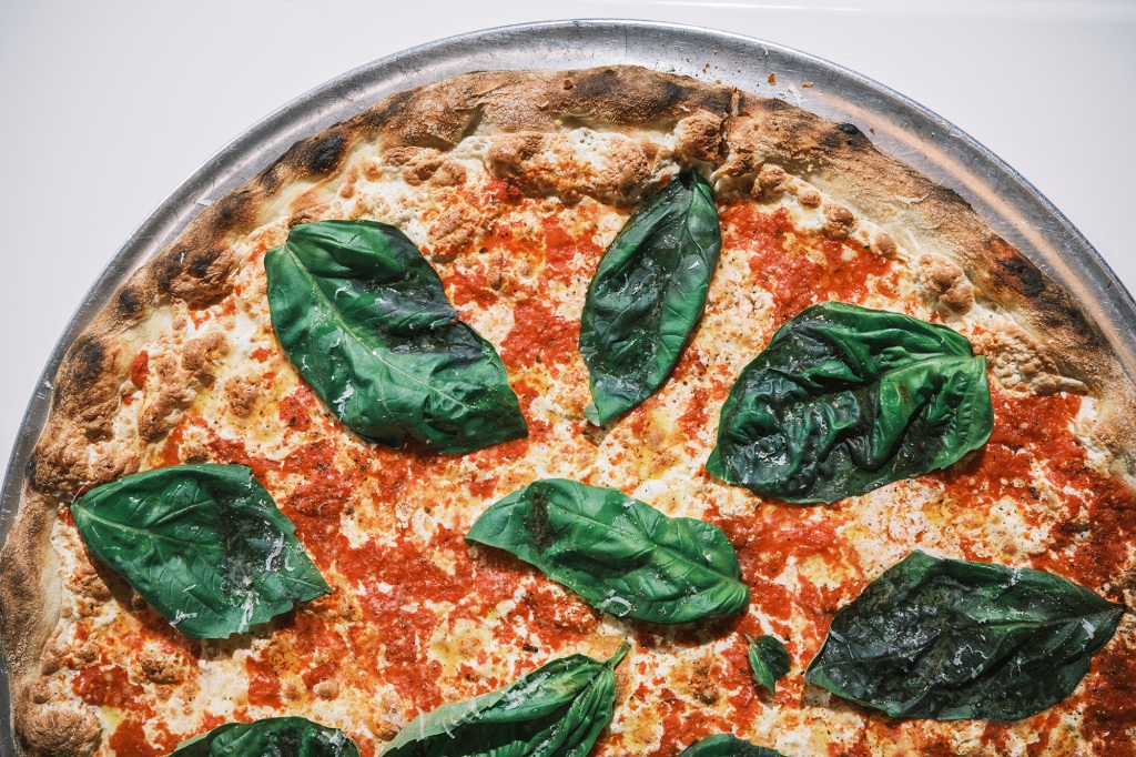 A classic margherita pizza from Bellucci's in Astoria, Queens.
