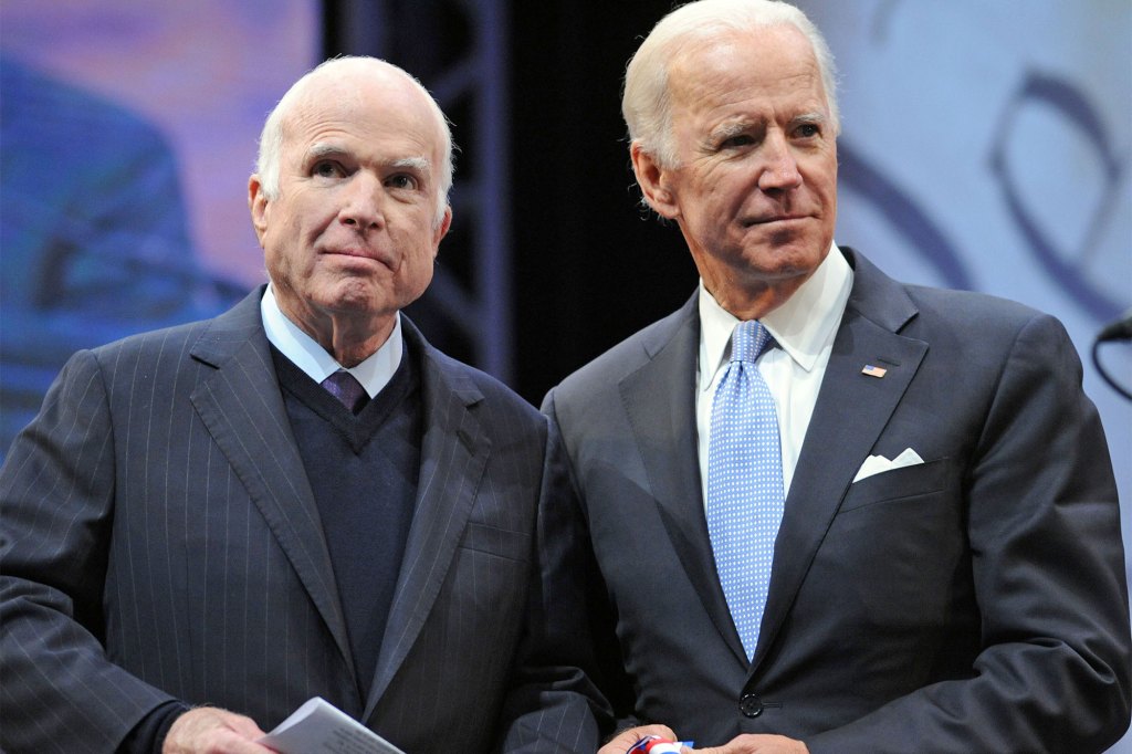 Sen. John McCain (R-AZ) receives the the 2017 Liberty Medal from former Vice President Joe Biden at the National Constitution Center on October 16, 2017 in Philadelphia, Pennsylvania.