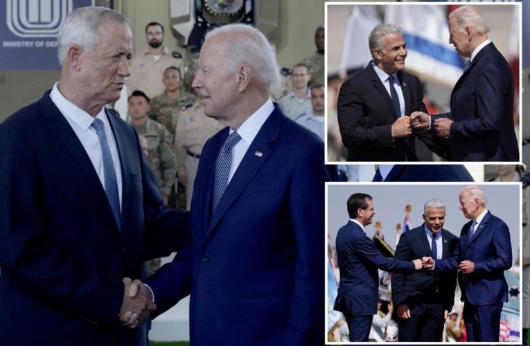 Biden forgoes handshakes for fist bumps after arriving in Israel