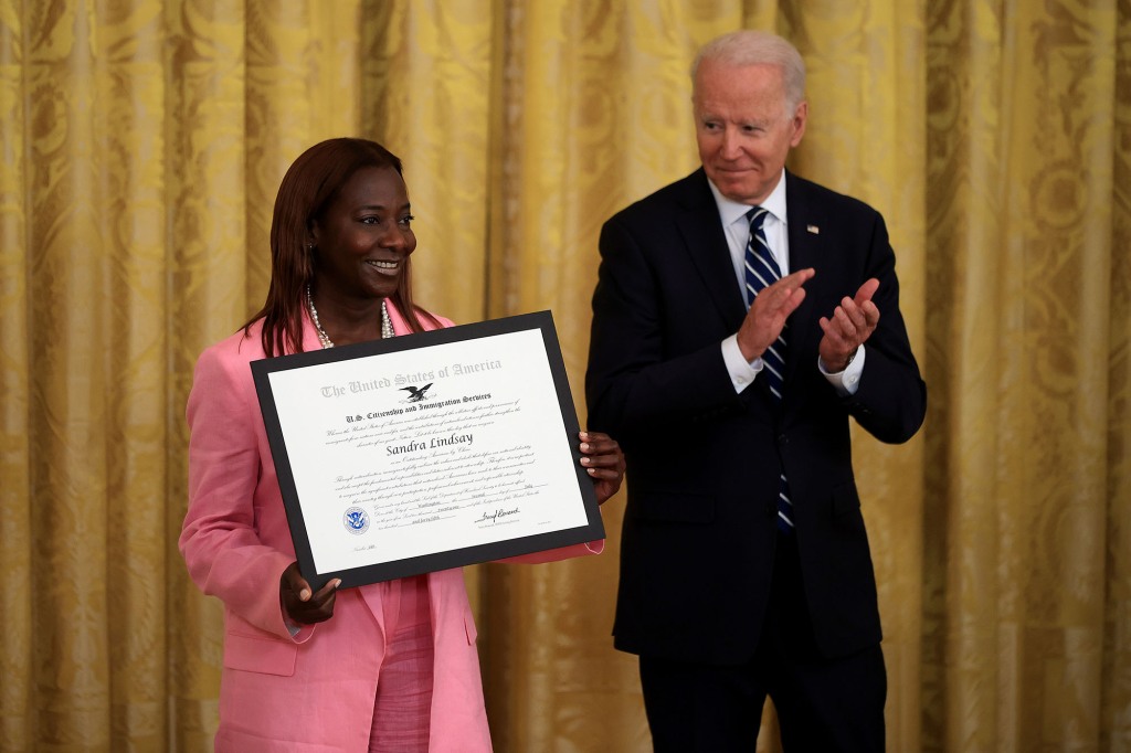 Jamaican immigrant Sandra Lindsay is presented with the U.S. Citizenship and Immigration Services' Outstanding Citizen By Choice award by U.S. President Joe Biden.