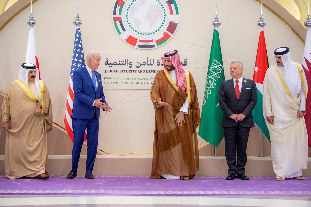 Saudi Crown Prince Mohammed bin Salman and U.S President Joe Biden gesture as they stand for a family photo ahead of the Jeddah Security and Development Summit in Jeddah, Saudi Arabia, July 16, 2022.