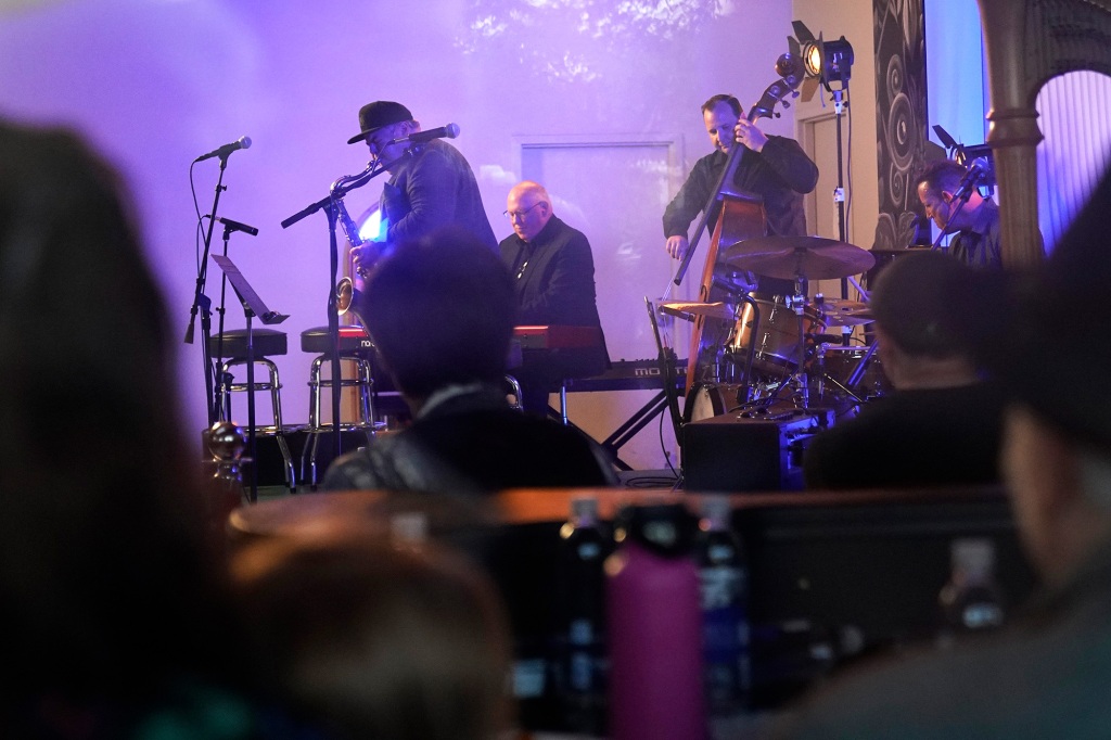 Jimmy Chamberlain, left, performs at Madame Zuzu, Wednesday, July 27, 2022, in Highland Park, Ill. Rock singer Billy Corgan of The Smashing Pumpkins will perform a charity livestream show on July 27 to benefit the victims of the Fourth of July parade shooting in suburban Chicago that killed seven people and wounded more than 30