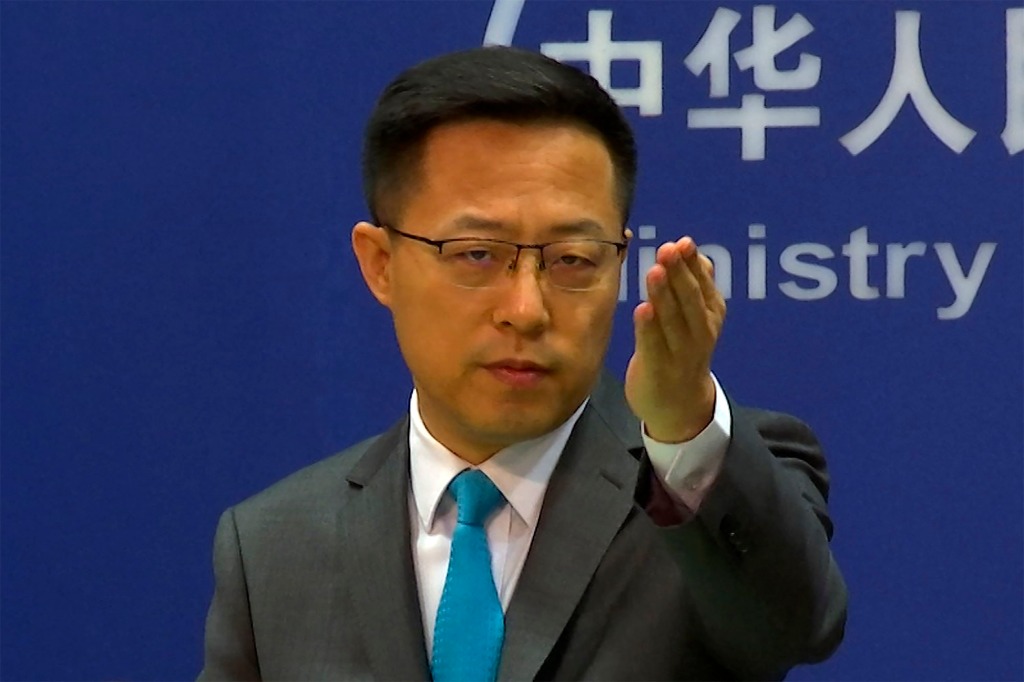 Foreign Ministry spokesman Zhao Lijian accuse the US and UK officials of trying to "smear and attack" China.