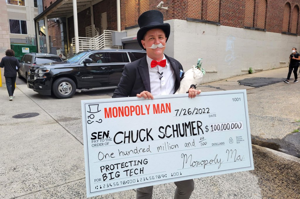Big Tech protester dressed as Mr. Monopoly