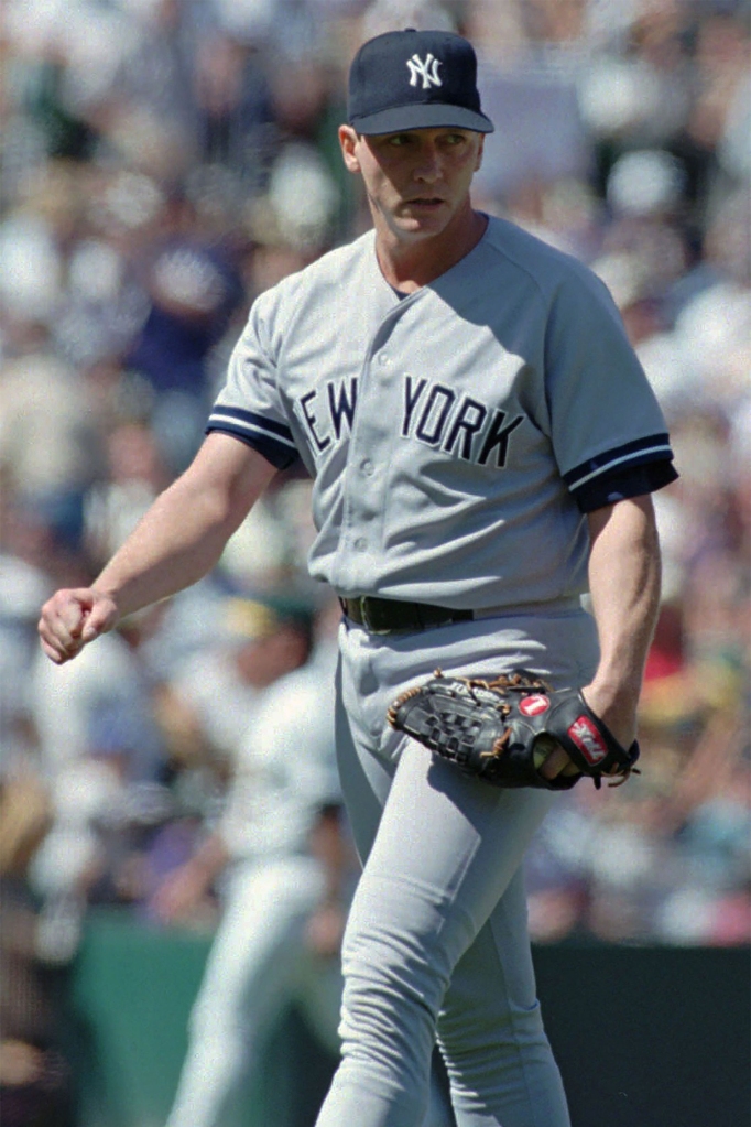 New York Yankees pitcher David Cone walks off the field after the seventh inning against the Oakland Athletics Monday, Sept. 2, 1996 in Oakland, Calif.