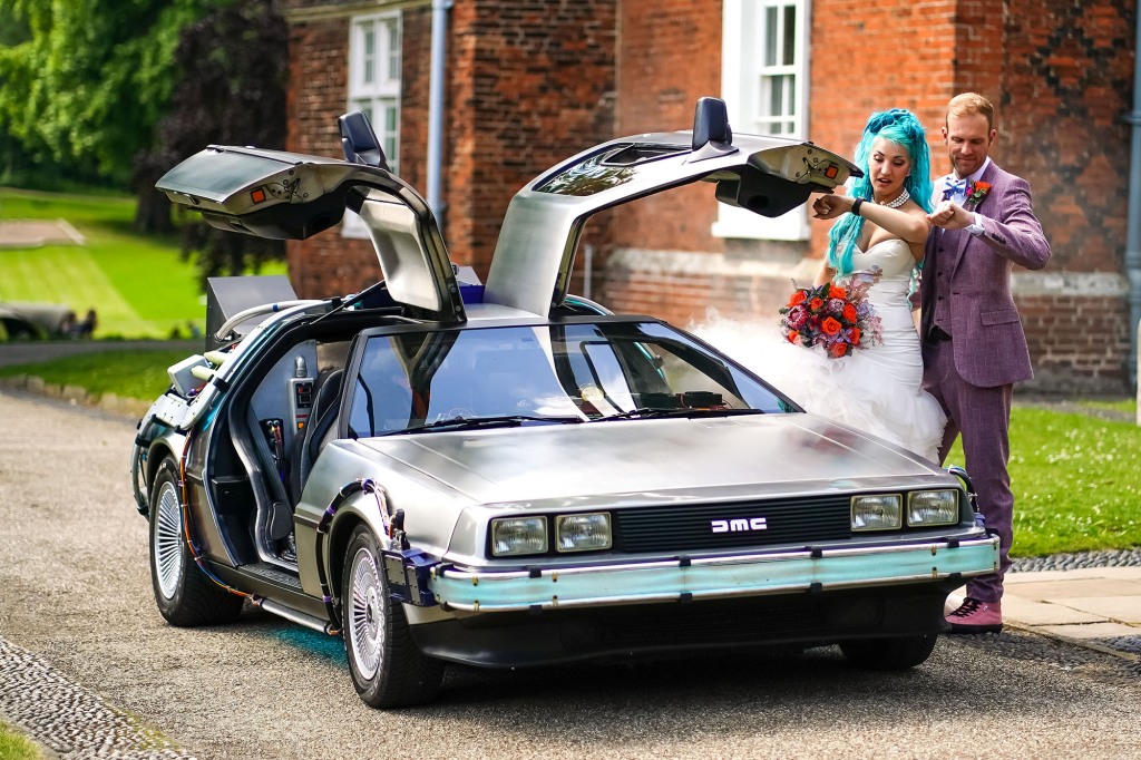 Couple finally celebrate their lockdown marriage with an epic Back To The Future themed wedding. Sci-fans Jordan, 33, and Pete Ayriss, 38, were able to celebrate their love in true 80s style last month.See SWNS story SWCAfuture. The pair from Ravenswood, Suffolk, married with just a dozen of their closest relatives in lockdown at the Manor Room in Christchurch Mansion.With many nods to the film on display, the biggest attraction of all was when the pair arrived in a replica DeLorean.Pete, who is originally from Felixstowe, said: "We are fans, every now and again we will have a Back To The Future off and throw each other trivia, throw out movie quotes at each other."It is a completely iconic trilogy and we do hope they never do anything else with it again. We did see the show and that was amazing."