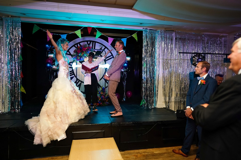 Couple finally celebrate their lockdown marriage with an epic Back To The Future themed wedding. Sci-fans Jordan, 33, and Pete Ayriss, 38, were able to celebrate their love in true 80s style last month.See SWNS story SWCAfuture. The pair from Ravenswood, Suffolk, married with just a dozen of their closest relatives in lockdown at the Manor Room in Christchurch Mansion.With many nods to the film on display, the biggest attraction of all was when the pair arrived in a replica DeLorean.Pete, who is originally from Felixstowe, said: "We are fans, every now and again we will have a Back To The Future off and throw each other trivia, throw out movie quotes at each other."It is a completely iconic trilogy and we do hope they never do anything else with it again. We did see the show and that was amazing."