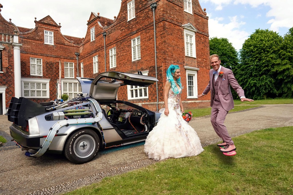 Couple finally celebrate their lockdown marriage with an epic Back To The Future themed wedding. Sci-fans Jordan, 33, and Pete Ayriss, 38, were able to celebrate their love in true 80s style last month.See SWNS story SWCAfuture. The pair from Ravenswood, Suffolk, married with just a dozen of their closest relatives in lockdown at the Manor Room in Christchurch Mansion.With many nods to the film on display, the biggest attraction of all was when the pair arrived in a replica DeLorean.Pete, who is originally from Felixstowe, said: "We are fans, every now and again we will have a Back To The Future off and throw each other trivia, throw out movie quotes at each other."It is a completely iconic trilogy and we do hope they never do anything else with it again. We did see the show and that was amazing."