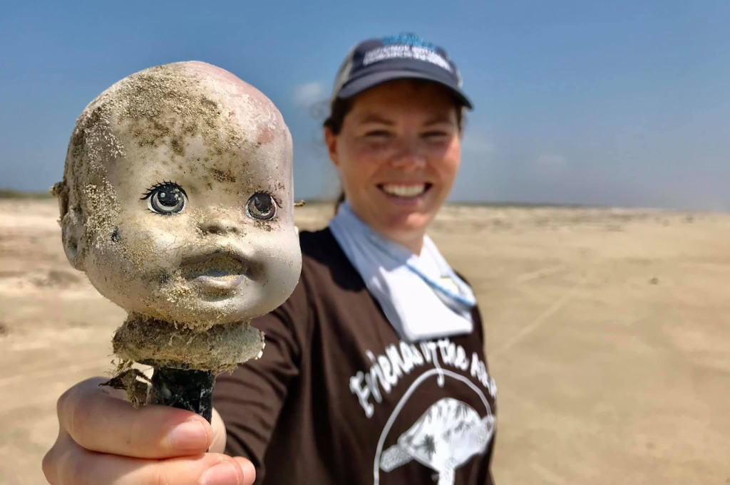 Doll heads on Texas beach