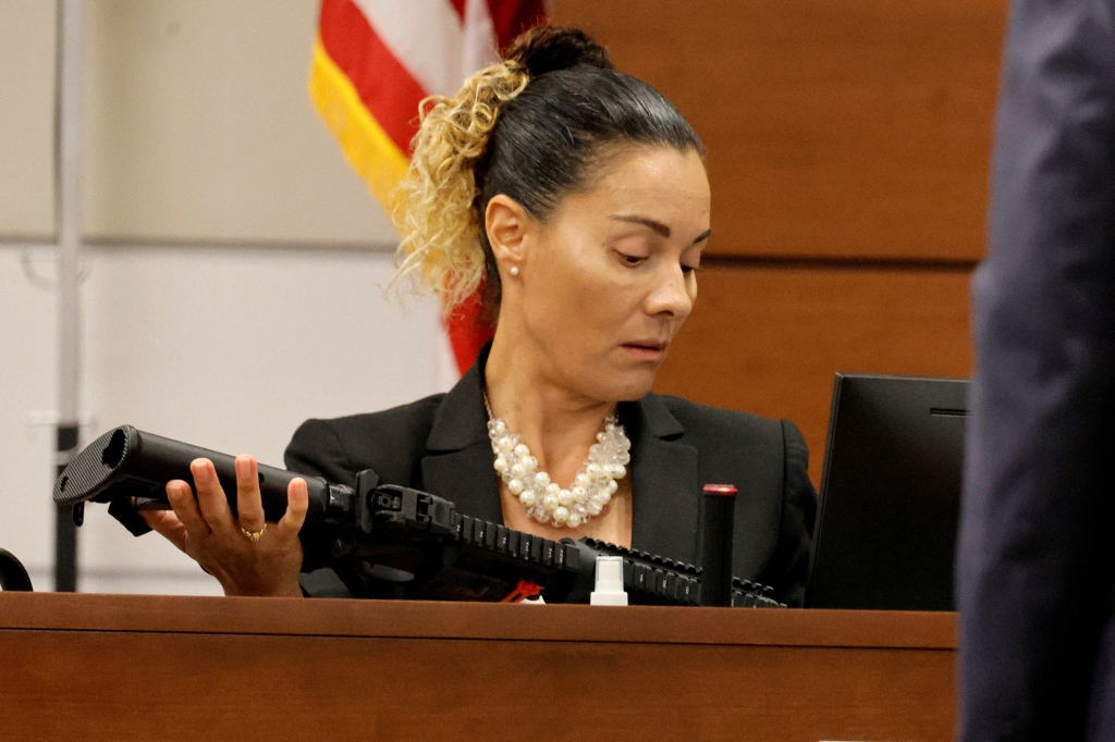 Broward Sheriff's Office Sgt. Gloria Crespo identifying the weapon at the trial.