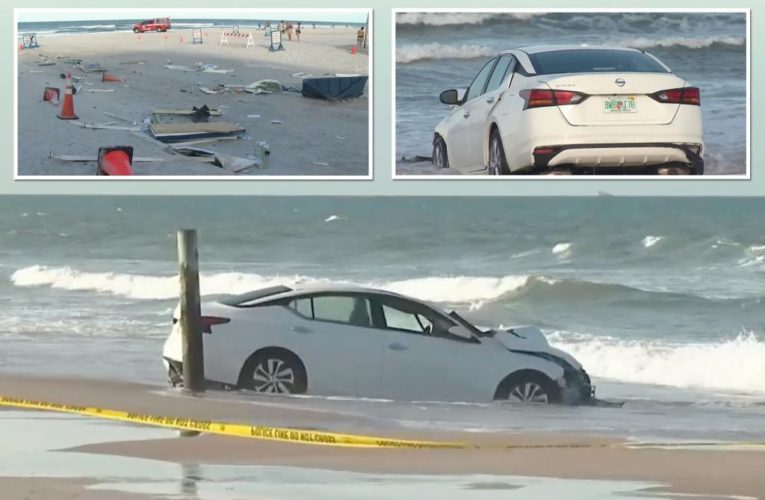 Car crashes through Florida toll booth, drives into ocean