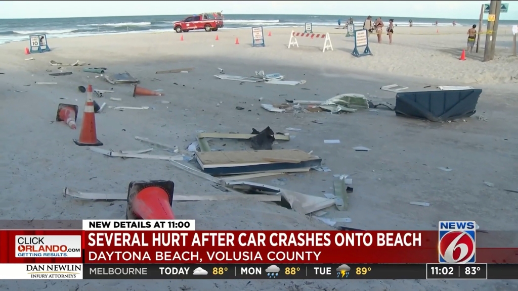 Debris is seen littering the ground at the International Speedway Boulevard beach approach following Sunday evening's crash. 