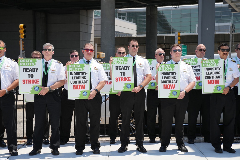 Delta pilots are seen picketing at Salt Lake City International Airport on Jun. 30, 2022, in Salt Lake City, demanding higher pay and more time off.